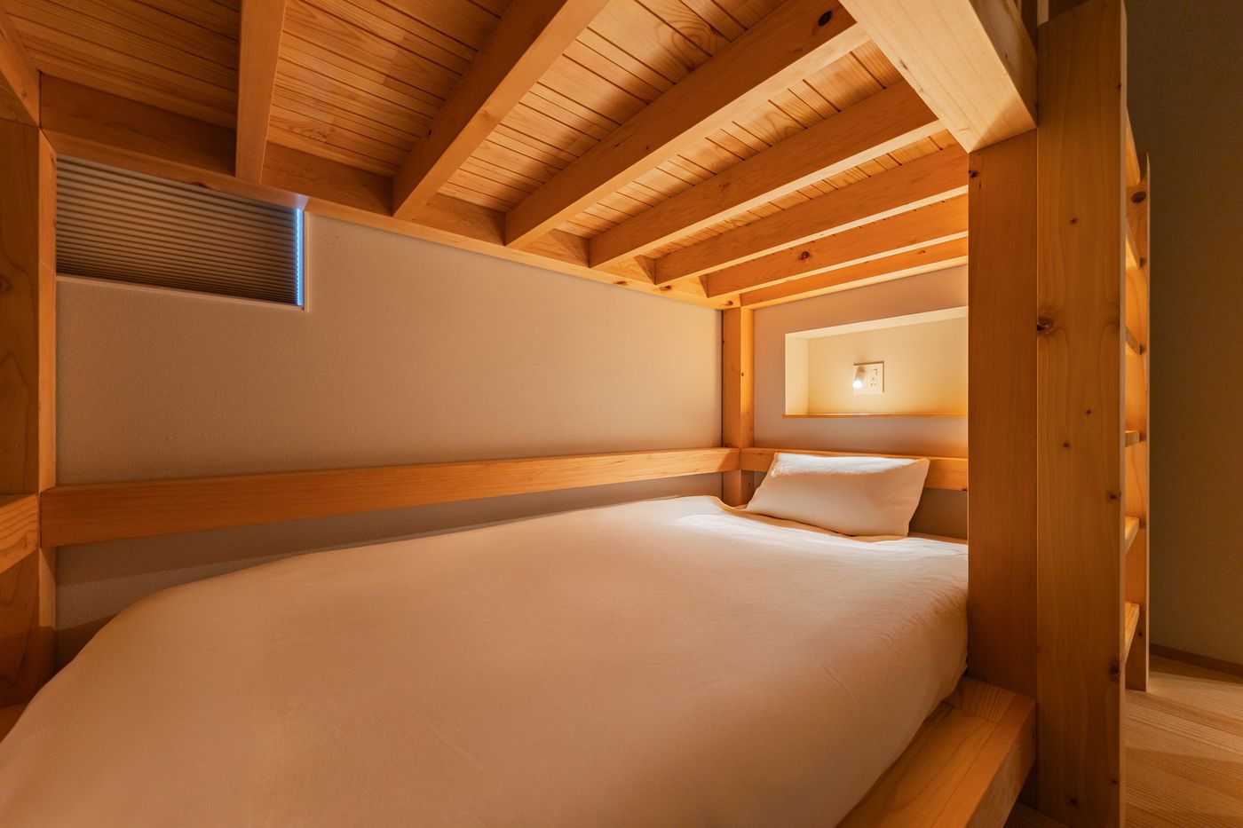Bedroom two: beds under exposed wooden beams